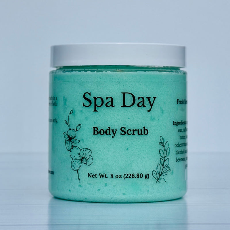 Jar of 'Spa Day' body scrub with a white lid on a light blue background