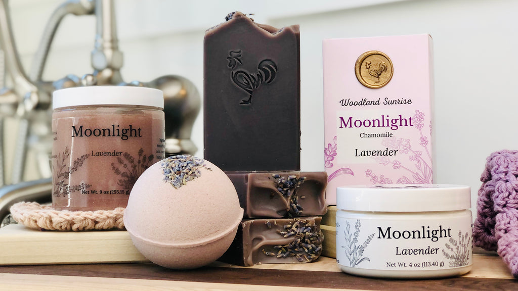 Moonlight Lavender Collection of products. Handcrafted Soap, Body Butter Cream, Body Scrub, Botanical Bath Bomb. 