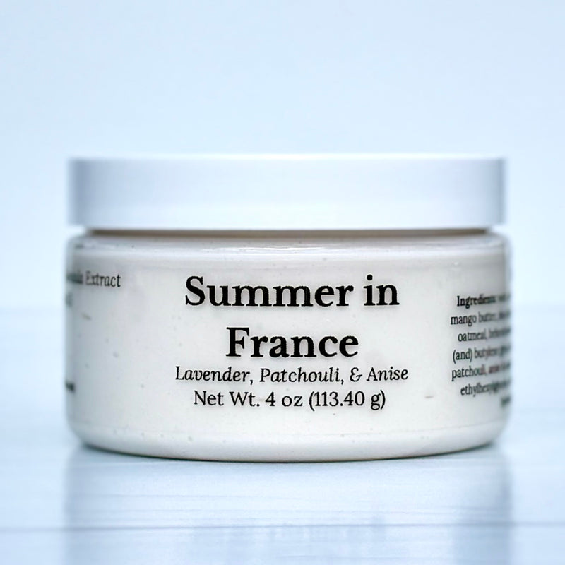 Jar of cream labeled 'Summer in France' on a light gray background