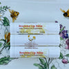 Two Beeswax Lip Balms with Vitamin E & Peppermint on a floral background