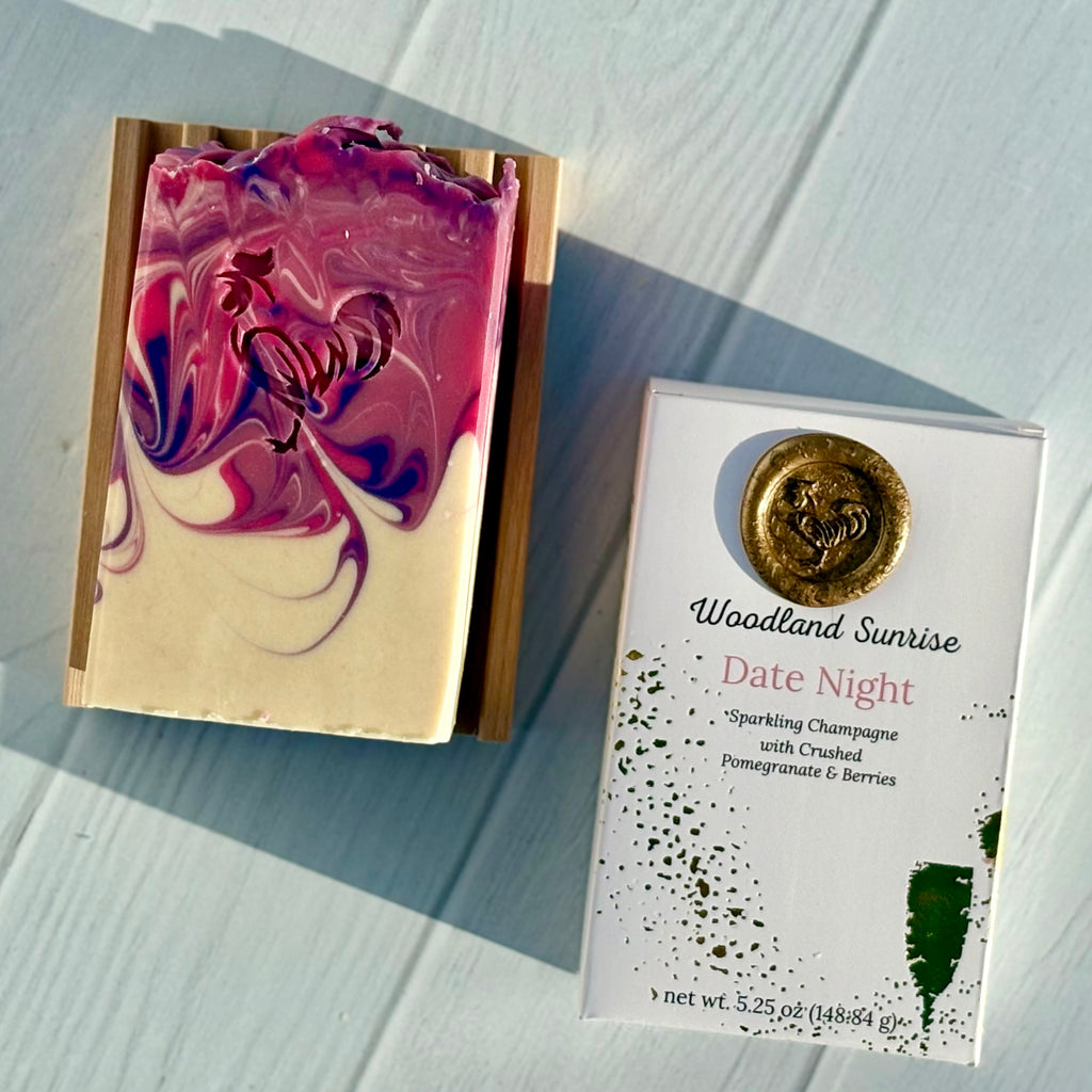 Marbled soap bar with a packaging label on a light wooden surface