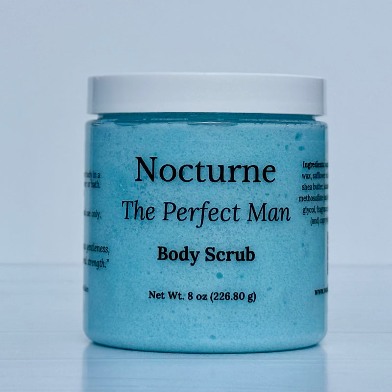 Jar of 'Nocturne The Perfect Man' body scrub on a light blue background