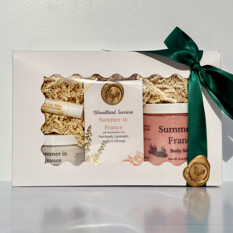 Gift set with body scrub and soap labeled 'Summer in France' on a white background