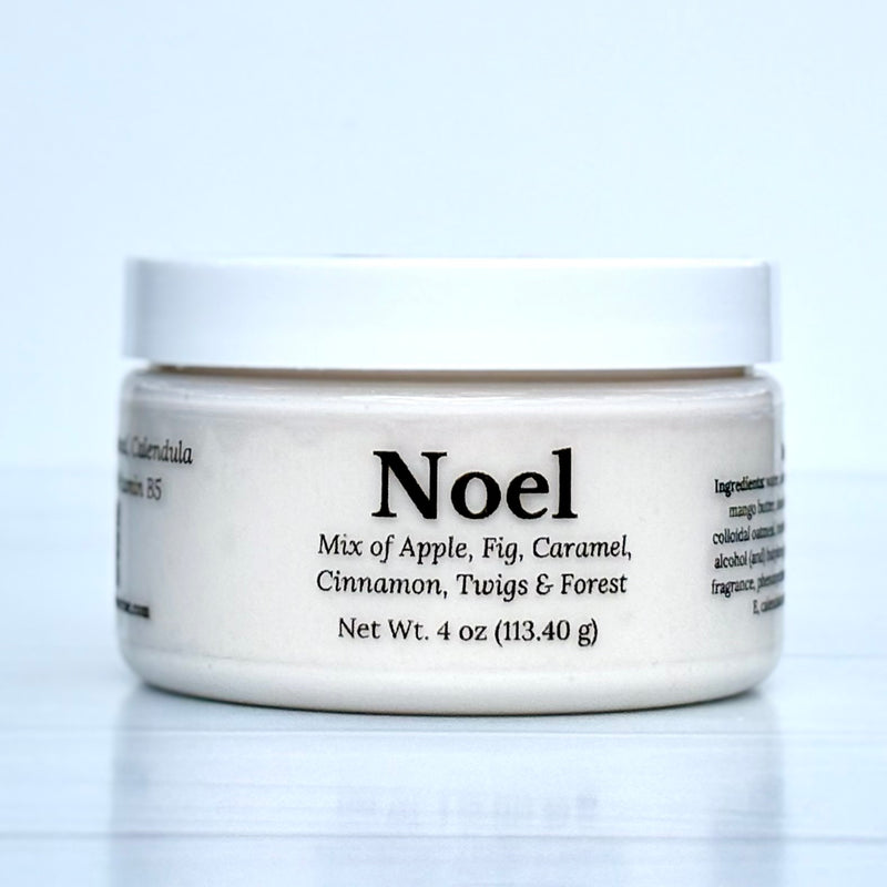 Jar of cream labeled 'Noel' with a white background